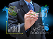 businessman hand drawing business graph