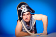 pirate with a cocked hat and a rope on blue