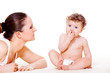Photo: Baby and his mother on carpet Baby and his mother on carpet