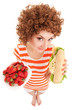 Fun woman with strawberry and sandwich on the white background Fun woman with strawberry and sandwich on the white background