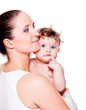 Mother and sweet curly baby in diaper Mother and sweet curly baby in diaper