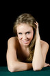 Portrait of the beautiful girl on a black