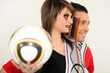 Young couple supporting German soccer Young couple supporting German soccer