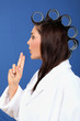 Woman with hair rollers