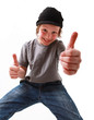 Foto: Happy casual young boy showing thumb up and smiling Happy casual young boy showing thumb up and smiling