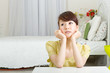 Beautiful woman relaxing in the room