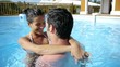 Lovers enjoying swimming-pool time