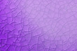 Abstract purple background with cracks