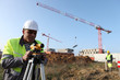 Photo: A land surveyor using an altometer A land surveyor using an altometer