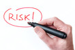 Foto: Hand writing Risk on whiteboard Hand writing Risk on whiteboard
