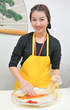 Woman cooking kimchi hand