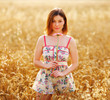adorable woman in field with flower adorable woman in field with flower