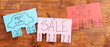 Color advertisements on wooden background