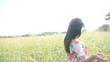 Attractive gypsie woman walking in country field