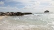 Closeup of couple walking by seashore