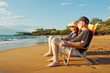 Happy Romantic Couple Enjoying Beautiful Sunset at the Beach
