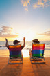 Happy Romantic Couple Enjoying Beautiful Sunset at the Beach