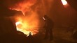 Worker operates in blast furnace workshop