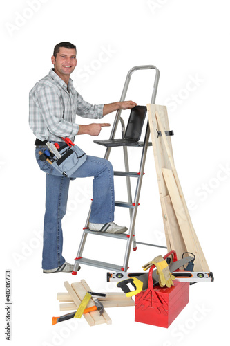Photo: Carpenter with a laptop Carpenter with a laptop