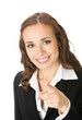 Businesswoman pointing finger at viewer, on white