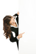 Businesswoman showing blank signboard, isolated