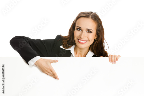 Photo: Businesswoman showing blank signboard, isolated Businesswoman showing blank signboard, isolated