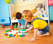 Girls playing with puzzle