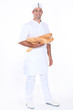 Baker with loaves of bread