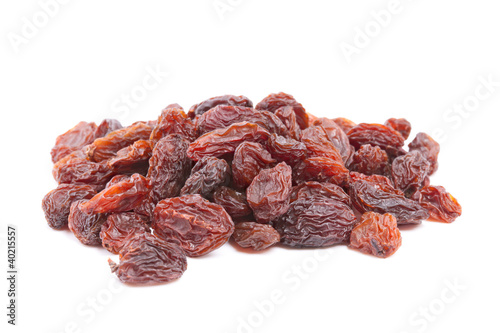Photo: Raisins isolated on white background. Raisins isolated on white background.