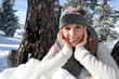Happy woman on a sunny winter's day