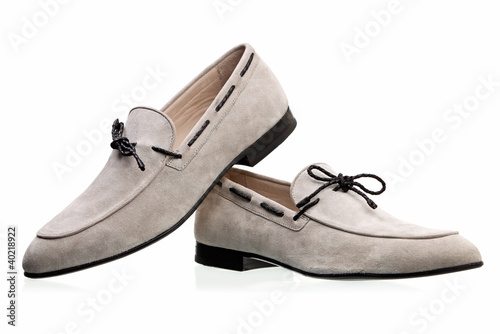 Photo: Pair of elegant men shoes over white background Pair of elegant men shoes over white background