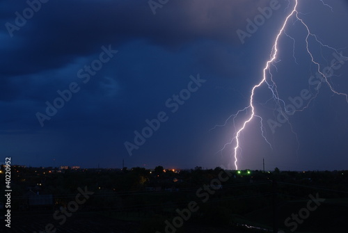 Photo: Lightning over small town Lightning over small town