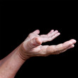 Photo: Two hands isolated on black Two hands isolated on black