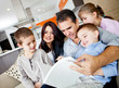 Family reading a book