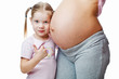 Beautiful pregnant woman with her daughter. Isolated on white Beautiful pregnant woman with her daughter. Isolated on white