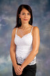Photo: pretty woman smiling and looking at camera pretty woman smiling and looking at camera