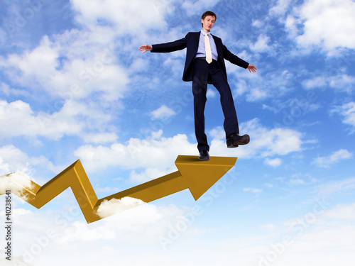 Photo: Young businessman taking risky steps Young businessman taking risky steps