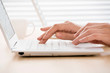 Hands and laptop