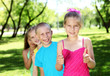 Foto: Children playing in the summer park Children playing in the summer park