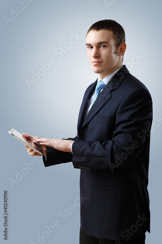 Photo: Young businessman making presentation Young businessman making presentation