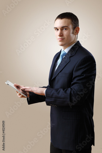 Photo: Young businessman making presentation Young businessman making presentation