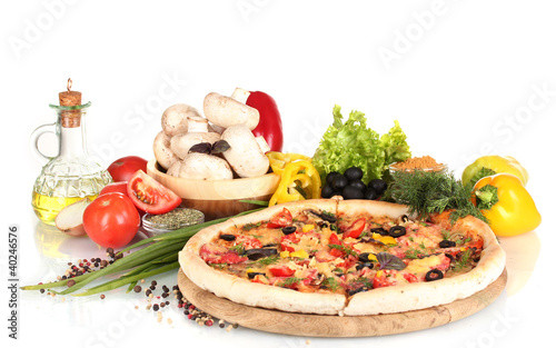 Photo: delicious pizza, vegetables, spices and oil isolated on white delicious pizza, vegetables, spices and oil isolated on white