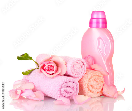 Photo: Towel and cleaning isolated on white Towel and cleaning isolated on white