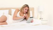 Video: Blonde haired woman using an ebook Blonde haired woman using an ebook