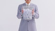 Serious businessman holding a bin