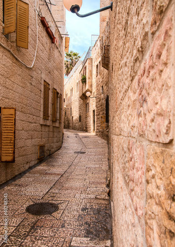 Photo: An alley in the old city in Jerusalem. An alley in the old city in Jerusalem.