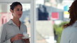 Women talking while drinking coffee