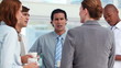 Business people having a conversation at break time
