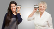 portrait of young girl and her grandmother hearing sounds using portrait of young girl and her grandmother hearing sounds using