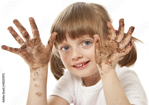 Photo: happy little girl with dirty hand - hygiene concept happy little girl with dirty hand - hygiene concept